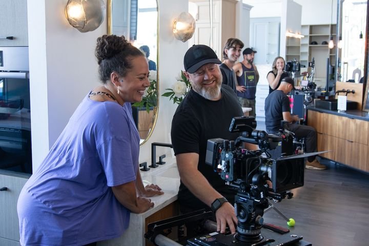 Crew and client laughing between takes